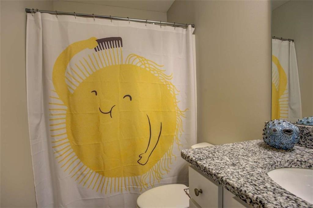 160 Savannah Way Milner, GA 30257 - Photo 26 of 41 a bathroom with a granite countertop sink and a mirror