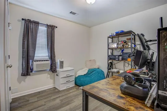 a view of a workspace with furniture