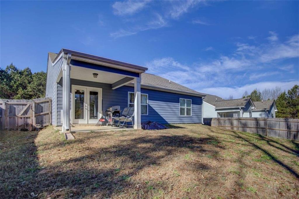 160 Savannah Way Milner, GA 30257 - Photo 29 of 41 a view of a house with a patio