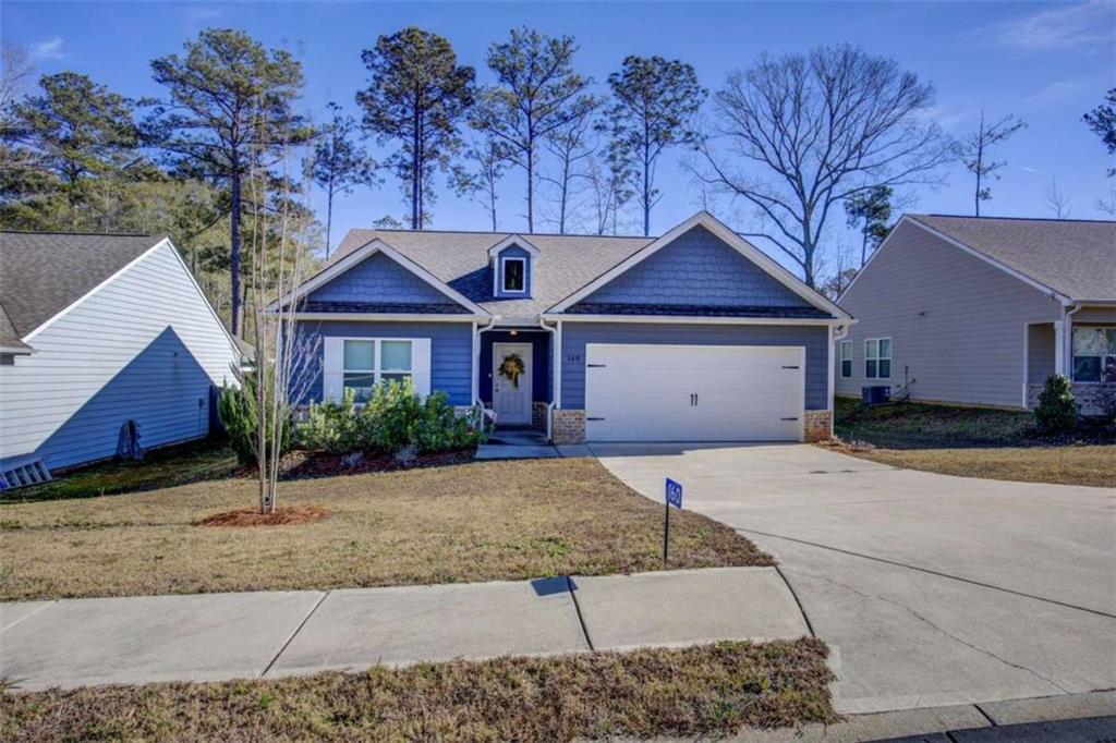 160 Savannah Way Milner, GA 30257 - Photo 37 of 41 a front view of a house with a yard