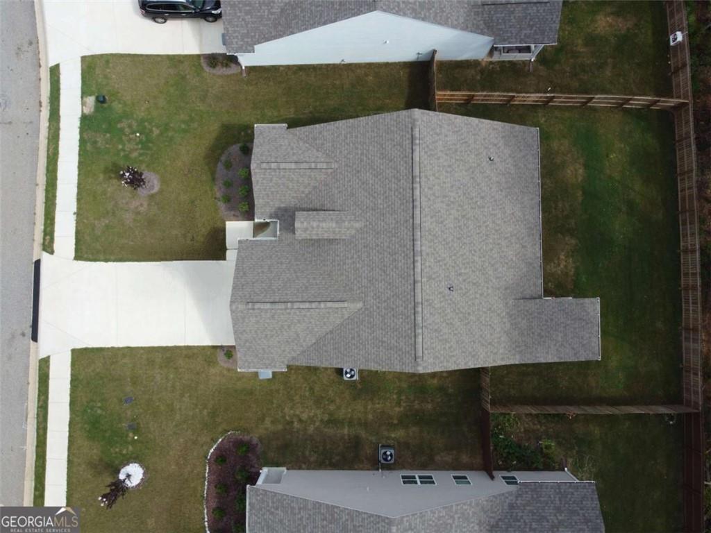 160 Savannah Way Milner, GA 30257 - Photo 41 of 41 an aerial view of a house with a yard