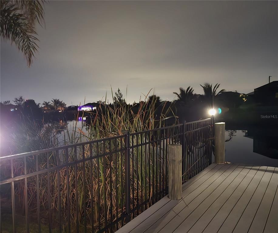 14970 Appleton Boulevard Port Charlotte, FL 33981 - Photo 12 of 48 a view of a balcony with wooden floor