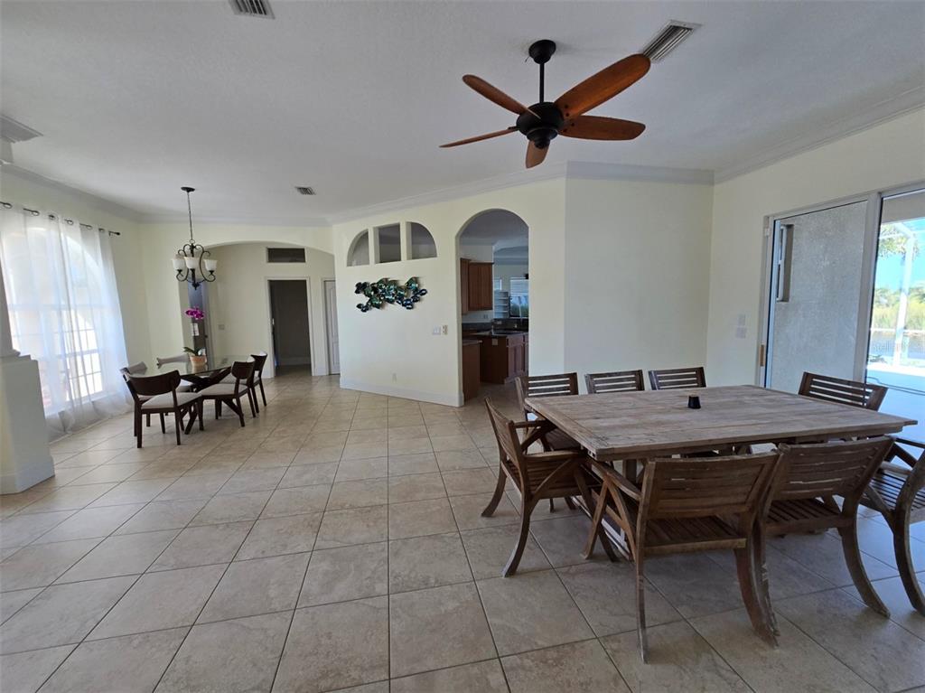 14970 Appleton Boulevard Port Charlotte, FL 33981 - Photo 17 of 48 a dining room with furniture and window