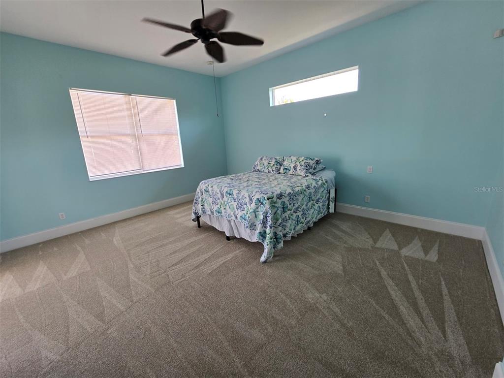 14970 Appleton Boulevard Port Charlotte, FL 33981 - Photo 20 of 48 a living room with furniture and a window