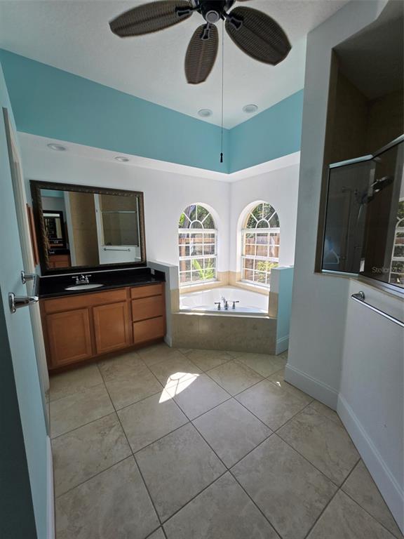 14970 Appleton Boulevard Port Charlotte, FL 33981 - Photo 21 of 48 a kitchen with stainless steel appliances a microwave a stove and cabinets