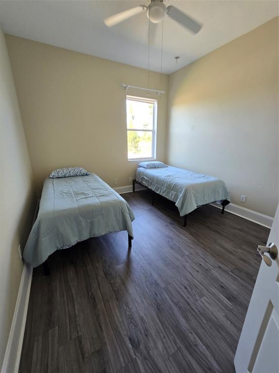 14970 Appleton Boulevard Port Charlotte, FL 33981 - Photo 29 of 48 a bedroom with a bed and a window