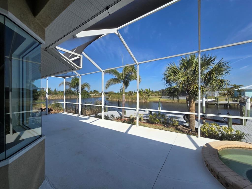 14970 Appleton Boulevard Port Charlotte, FL 33981 - Photo 40 of 48 a view of a swimming pool with outdoor seating