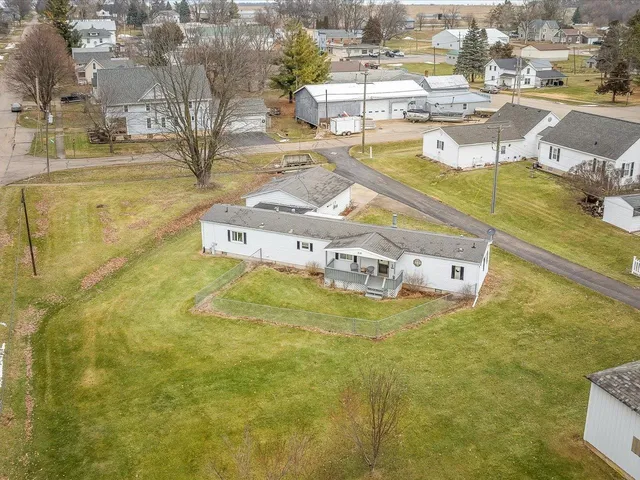 a view of a swimming pool with an outdoor seating