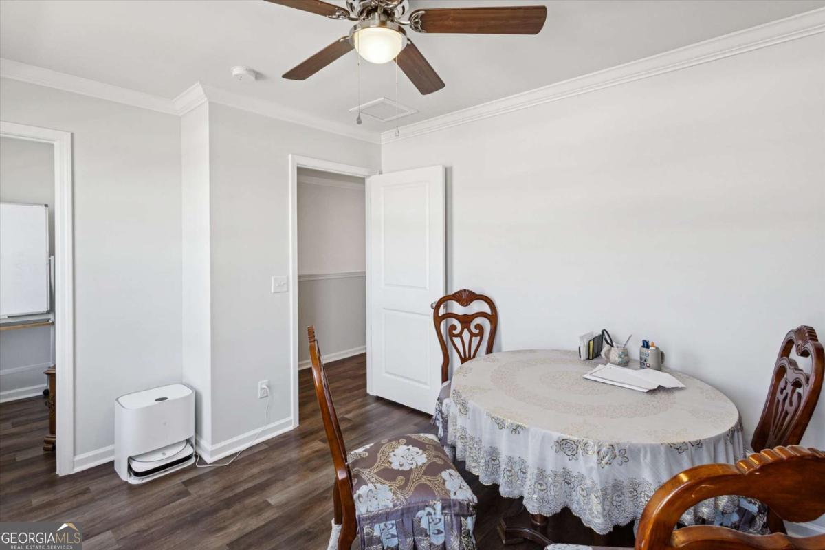 455 Tondee Way Midway, GA 31320 - Photo 21 of 52 a bathroom with a sink and a mirror