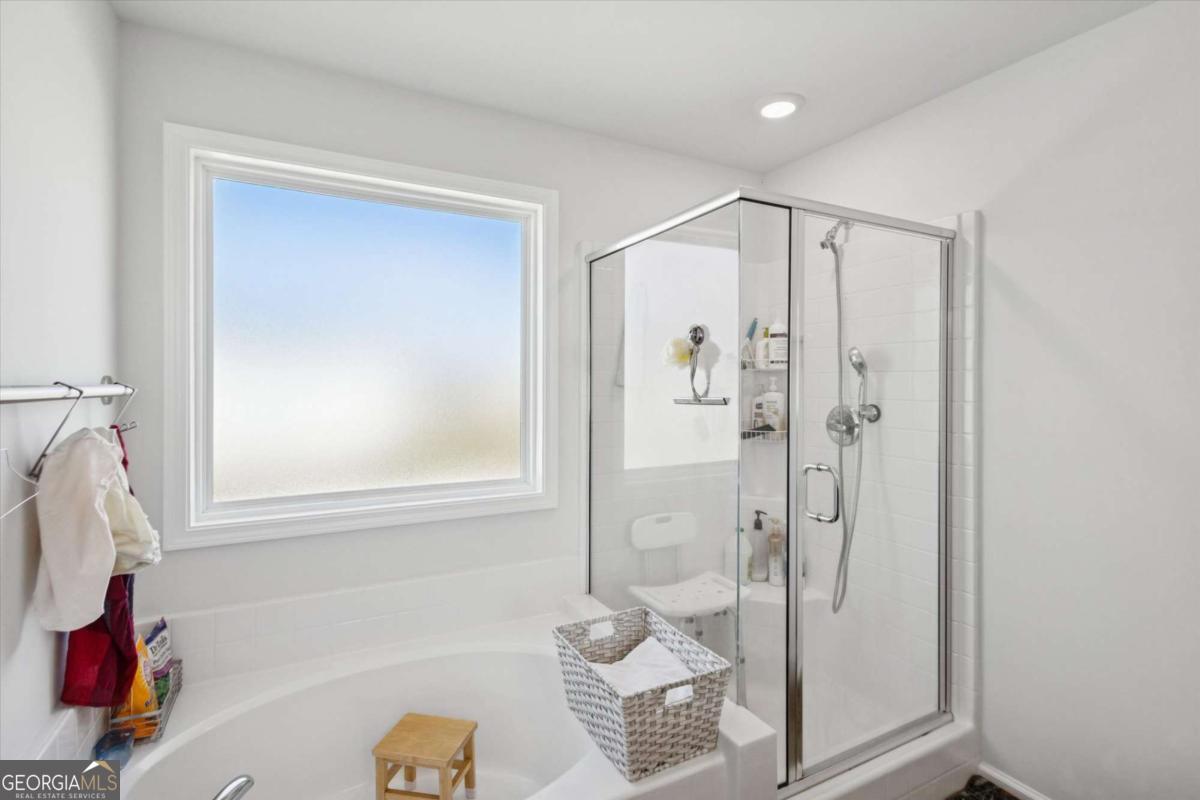 455 Tondee Way Midway, GA 31320 - Photo 31 of 52 a bathroom with a shower and a sink