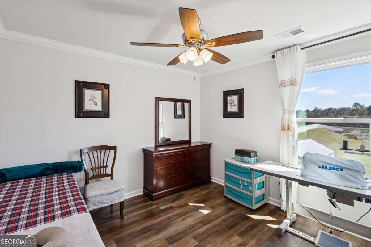 455 Tondee Way Midway, GA 31320 - Photo 36 of 52 a living room with furniture
