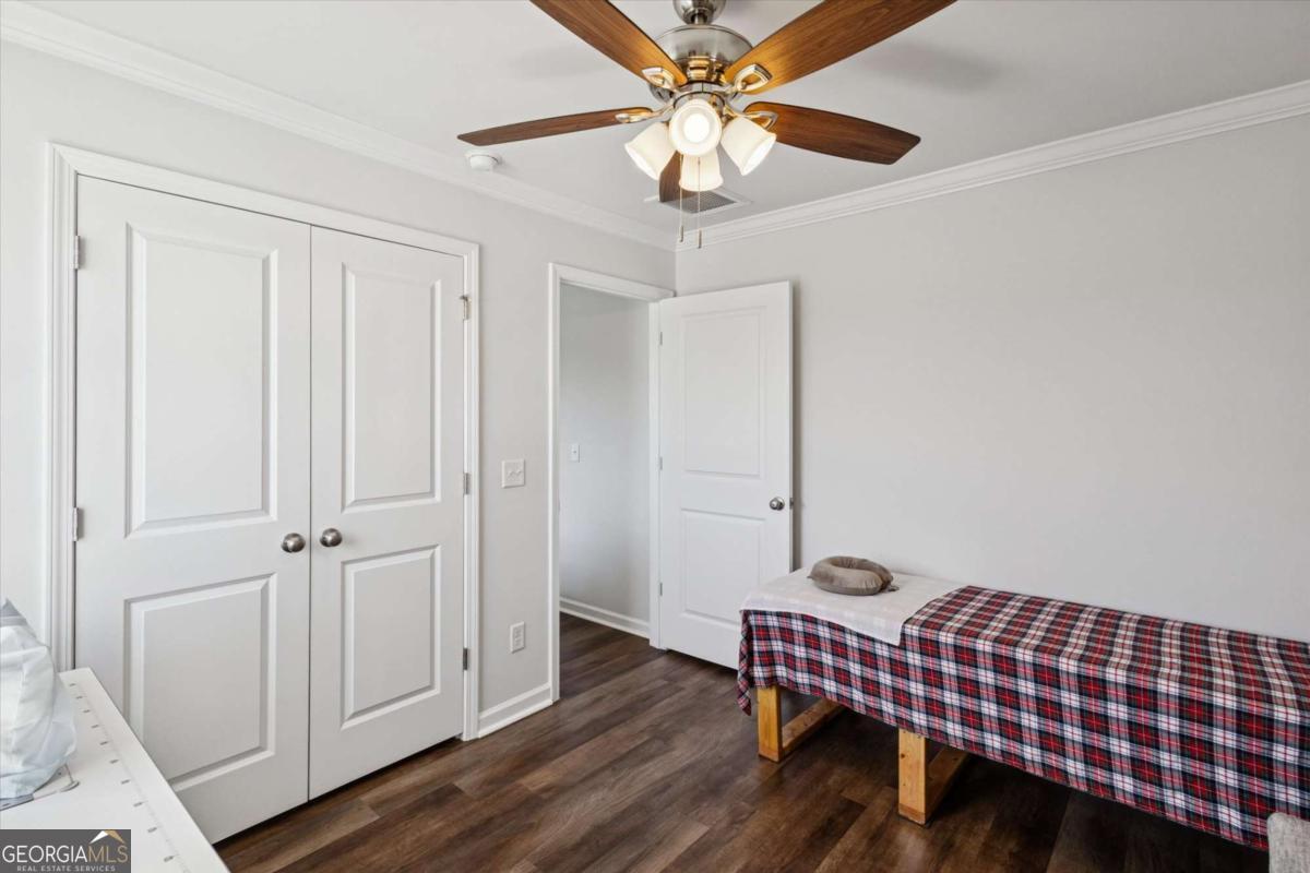 455 Tondee Way Midway, GA 31320 - Photo 37 of 52 wooden floor in a hall with an entryway