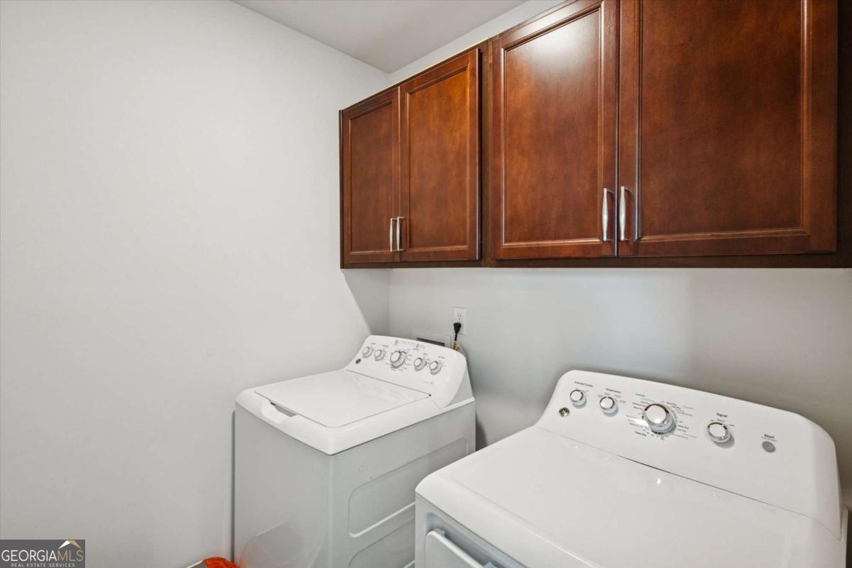 455 Tondee Way Midway, GA 31320 - Photo 38 of 52 a utility room with dryer and washer