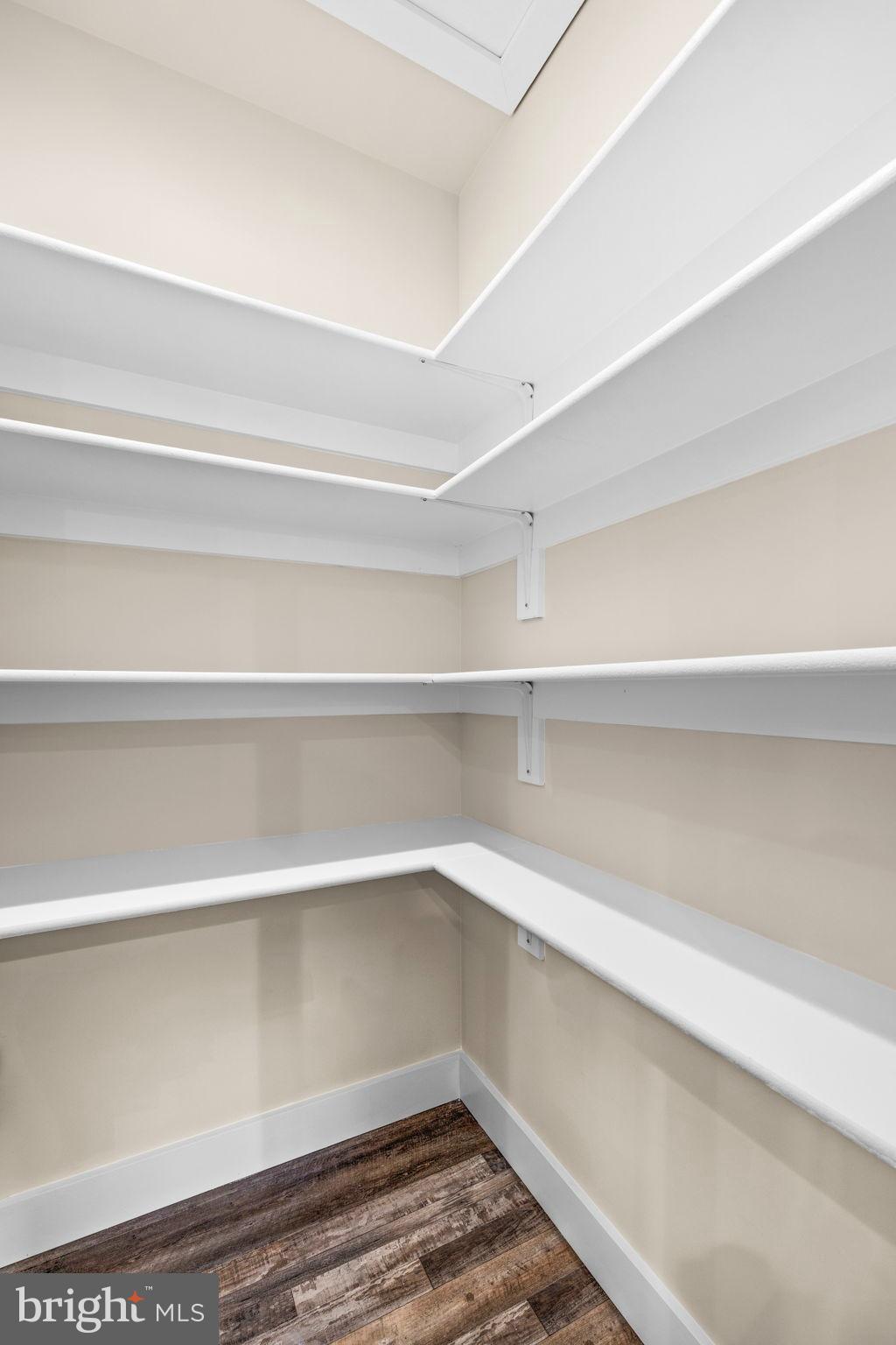 312 9th Street Colonial Beach, VA 22443 - Photo 11 of 59 a view of a room with empty racks