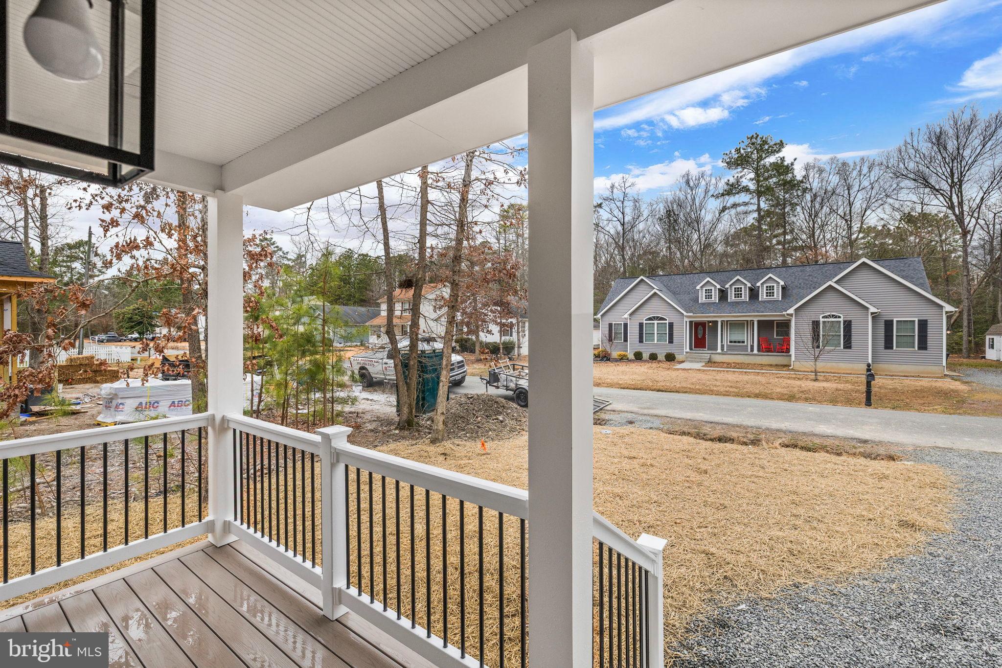 312 9th Street Colonial Beach, VA 22443 - Photo 29 of 59 a view of house with a street from a balcony