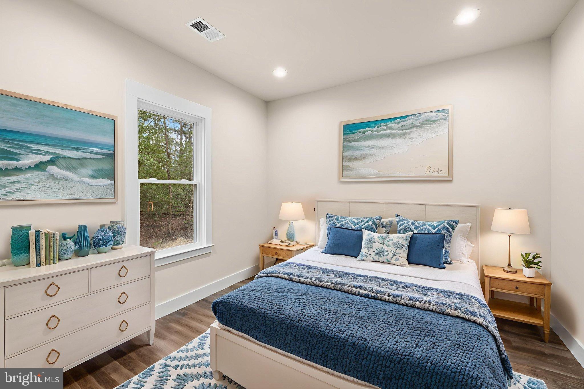 312 9th Street Colonial Beach, VA 22443 - Photo 6 of 59 a bedroom with a bed and window