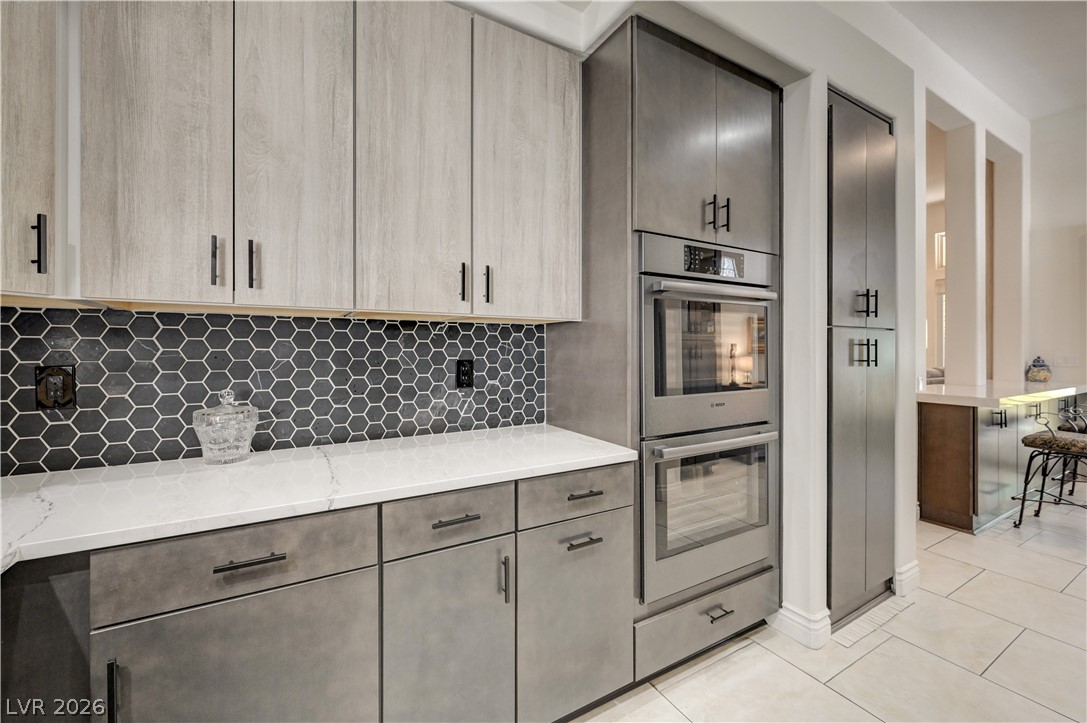 457 Indigo Springs Street Henderson, NV 89014 - Photo 12 of 58 Fully remodeled kitchen with Bosch double ovens.