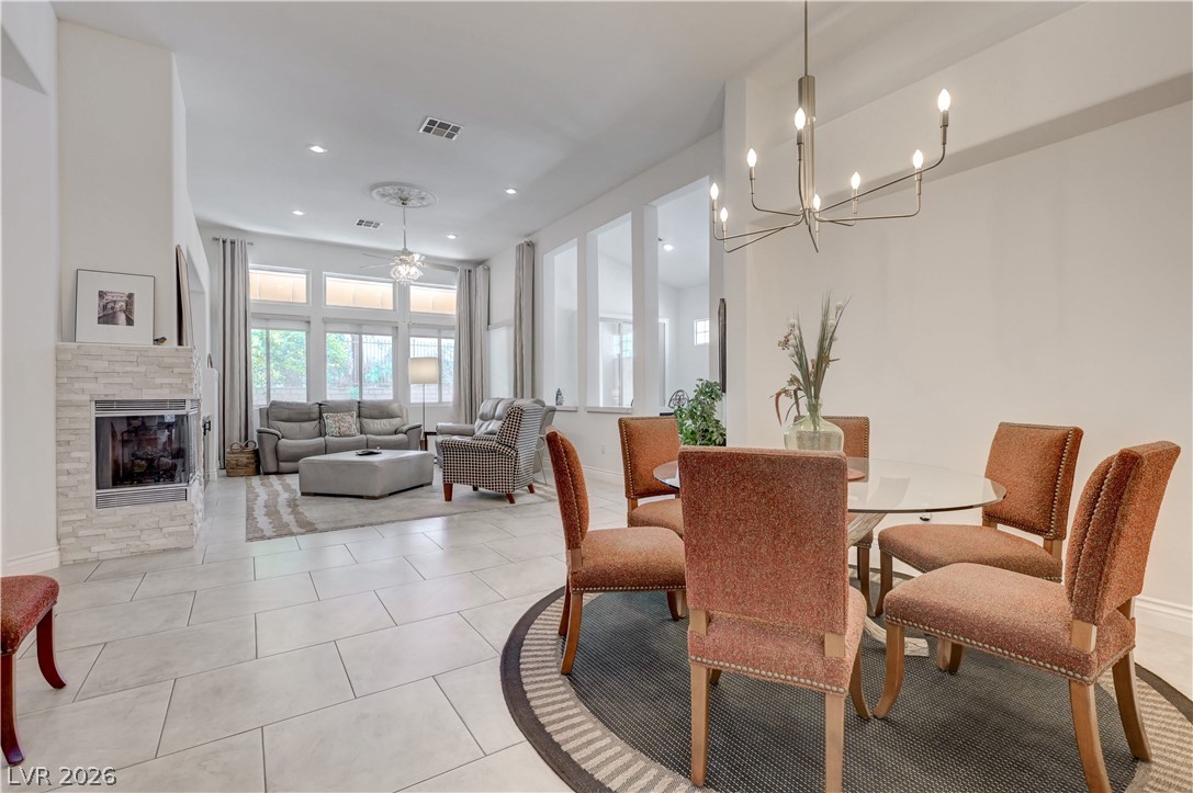 457 Indigo Springs Street Henderson, NV 89014 - Photo 58 of 58 Open floor plan with dining room adjacent to the living area.