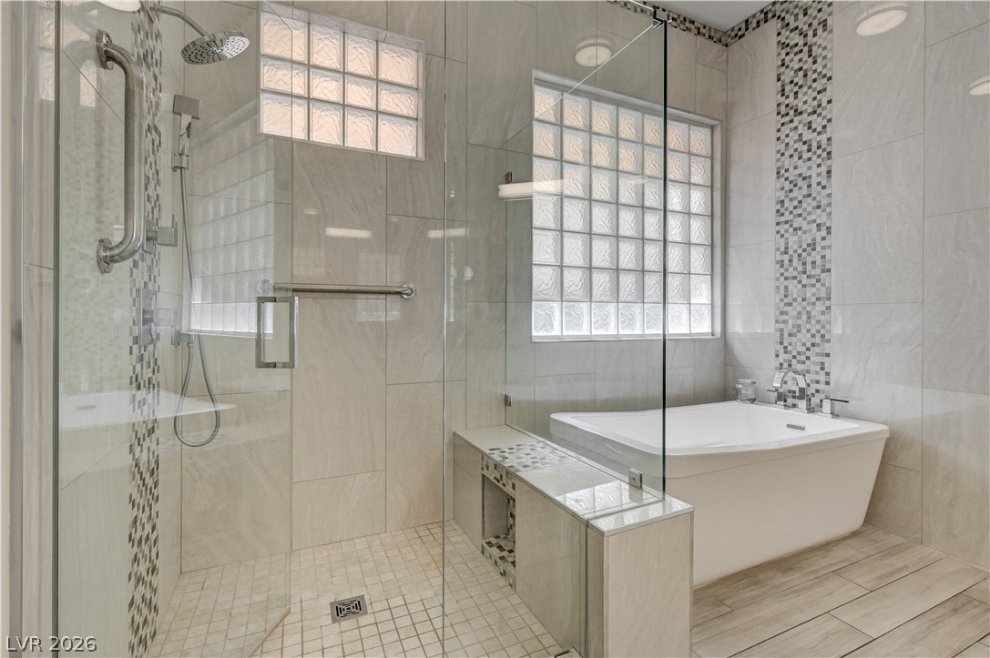 457 Indigo Springs Street Henderson, NV 89014 - Photo 21 of 58 Shower grab bars and dual shower heads.