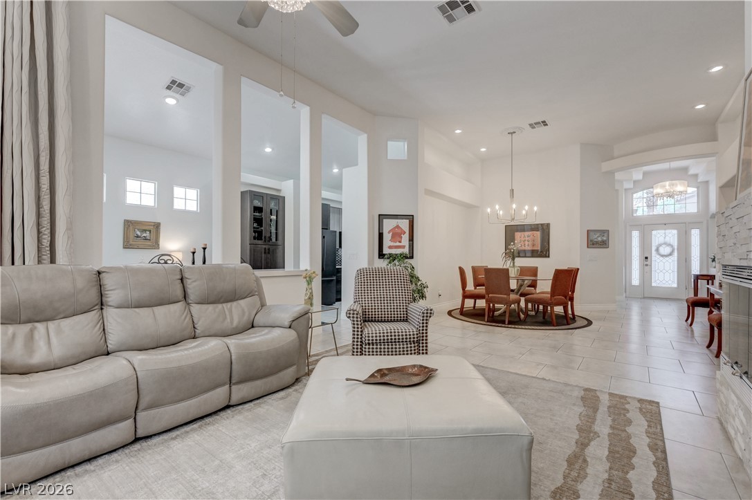 457 Indigo Springs Street Henderson, NV 89014 - Photo 2 of 58 Architecturally pleasing high vaulted ceilings and tall archways give an open, airy feeling.