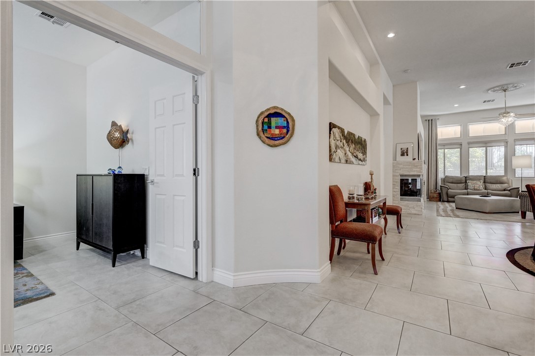457 Indigo Springs Street Henderson, NV 89014 - Photo 31 of 58 The entry to the 3rd bedroom (used currently as a den) is to the left of the main entrance.