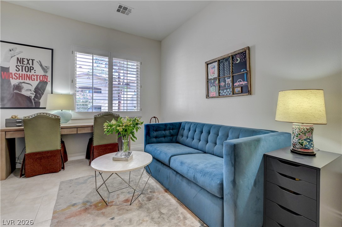 457 Indigo Springs Street Henderson, NV 89014 - Photo 33 of 58 3rd bedroom with shutters and ceiling fan.