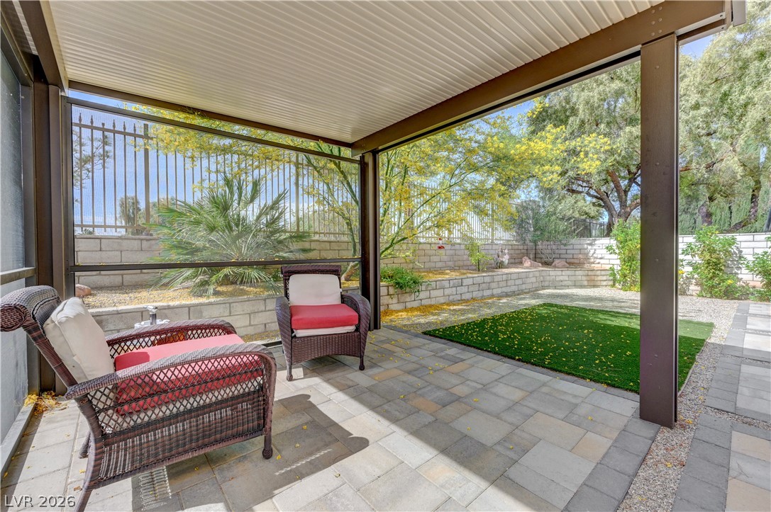 457 Indigo Springs Street Henderson, NV 89014 - Photo 38 of 58 Backyard covered seating area.