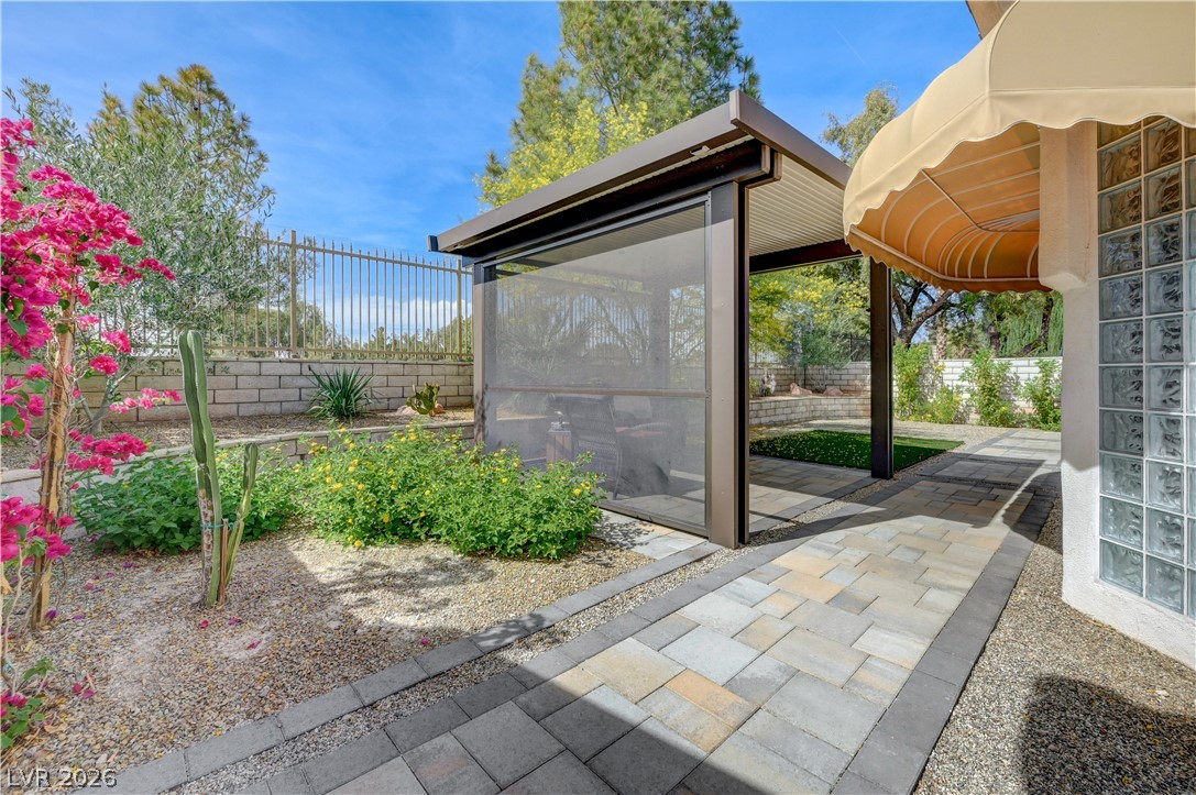 457 Indigo Springs Street Henderson, NV 89014 - Photo 39 of 58 Backyard covered seating area.