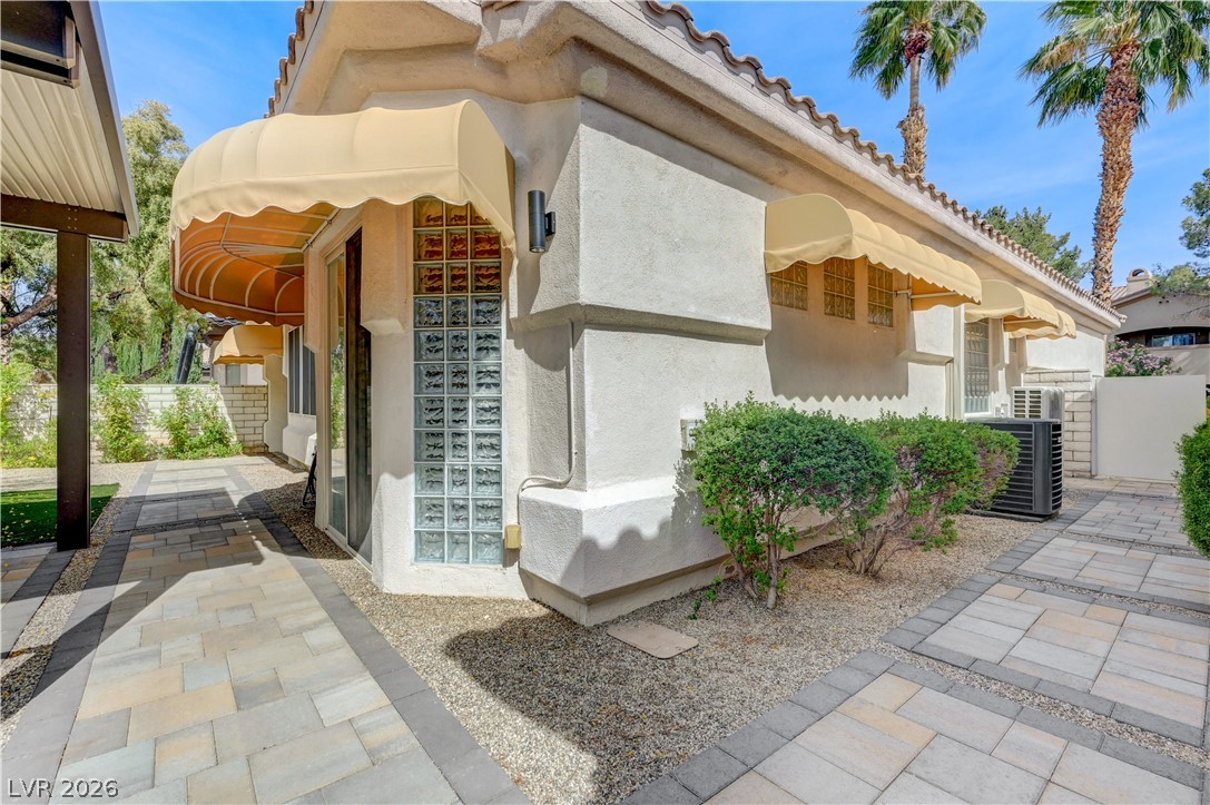 457 Indigo Springs Street Henderson, NV 89014 - Photo 42 of 58 Backyard and side of the house.