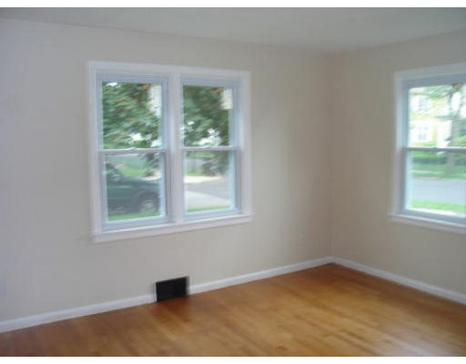 6 Alsace Street Springfield, MA 01108 - Photo 6 of 11 an empty room with a window