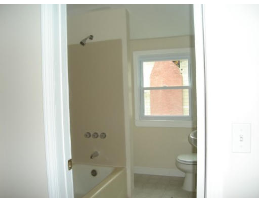 6 Alsace Street Springfield, MA 01108 - Photo 10 of 11 a bathroom with a glass shower door