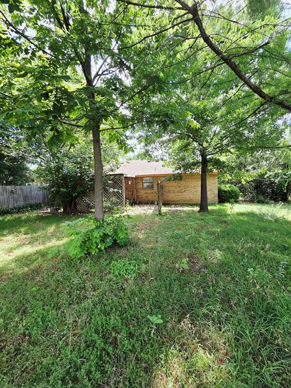 722 South Church Street Pilot Point, TX 76258 - Photo 23 of 37 a view of a house with a yard