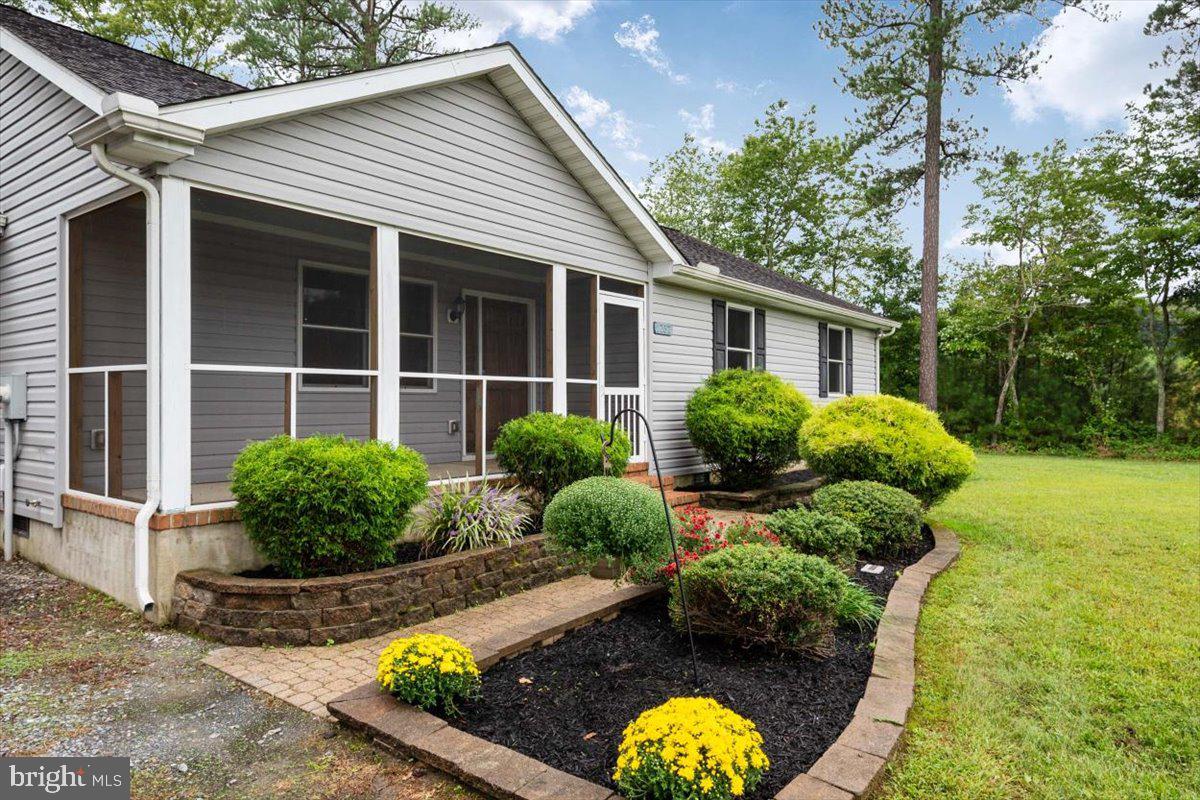 Professionally landscaped lead walk to front door