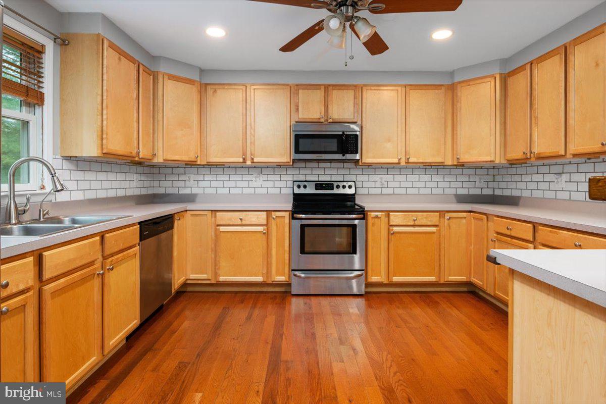 1232 Perrys Corner Road Grasonville, MD 21638 - Photo 11 of 35 TONS of cabinetry in this kitchen!