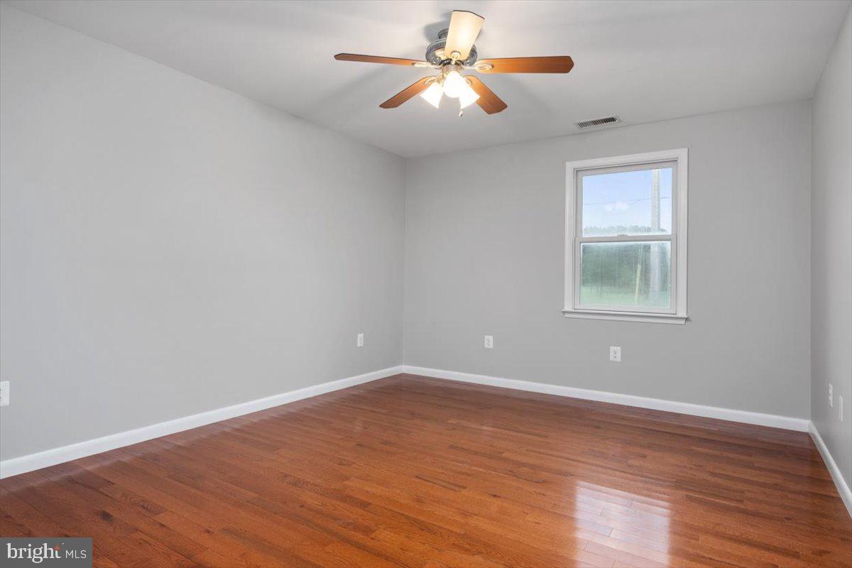 1232 Perrys Corner Road Grasonville, MD 21638 - Photo 17 of 35 Bedroom #2 w/ Hardwood Floors