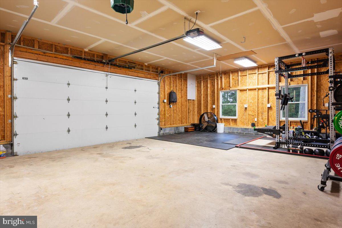 1232 Perrys Corner Road Grasonville, MD 21638 - Photo 24 of 35 HUGE garage w/ room for 2 cars PLUS Storage/gym