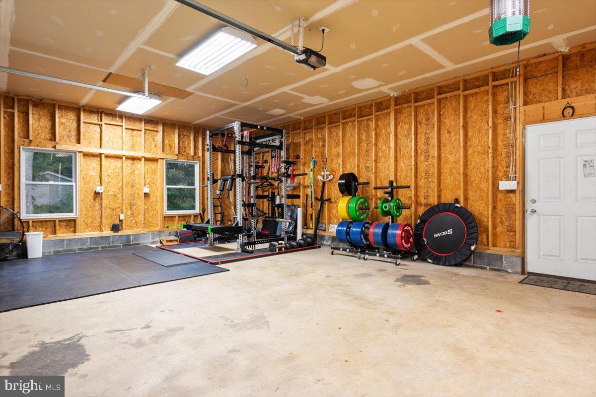 1232 Perrys Corner Road Grasonville, MD 21638 - Photo 25 of 35 Extremely spacious attached garage w/ attic storge