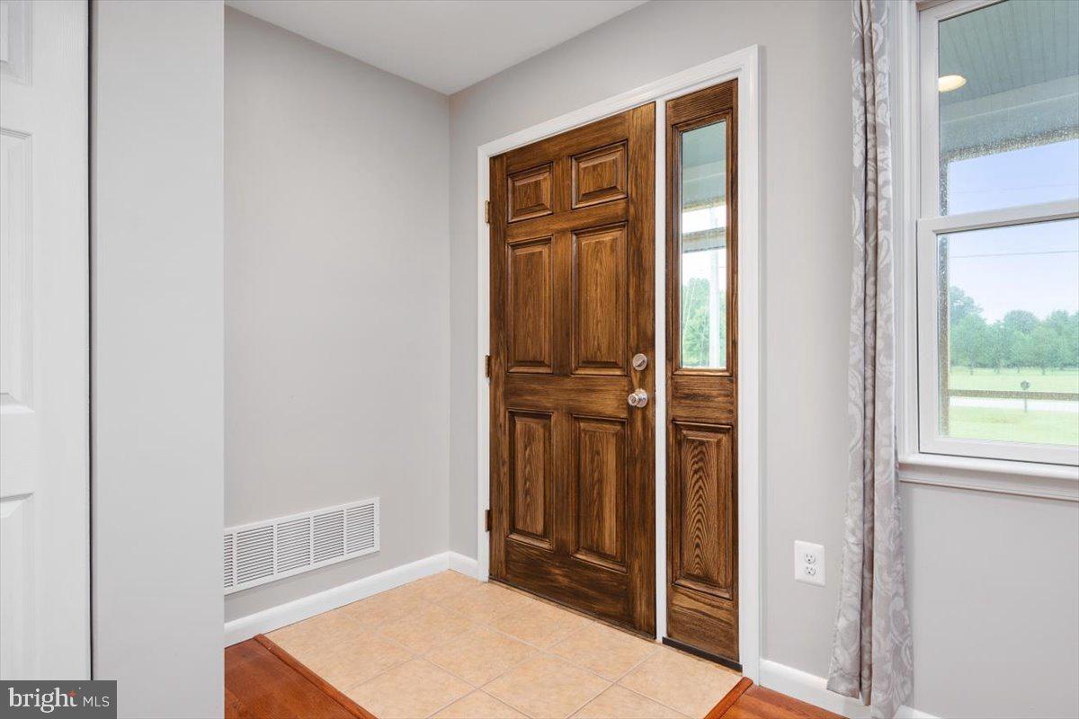 Tiled Foyer Area upon entering the front door