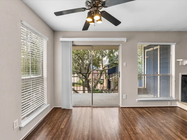 a kitchen with stainless steel appliances granite countertop a sink and a stove