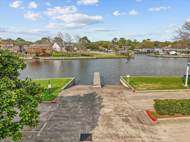 a view of a lake with a city