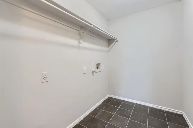 a view of a hardwood floor in a room