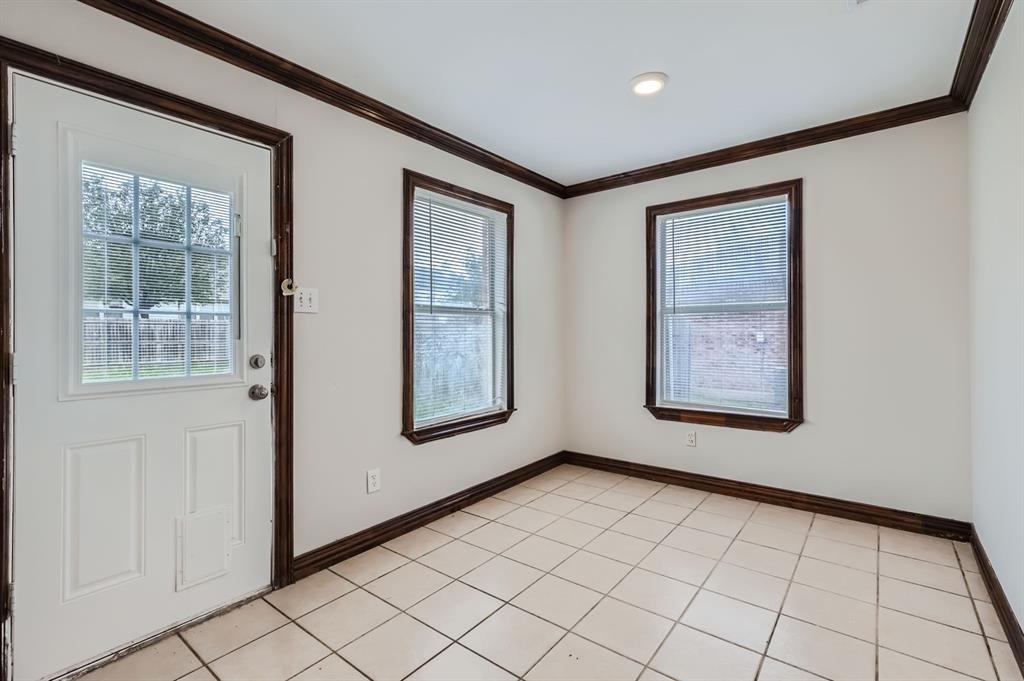 1406 Buckingham Drive Forney, TX 75126 - Photo 2 of 30 a view of an empty room and window
