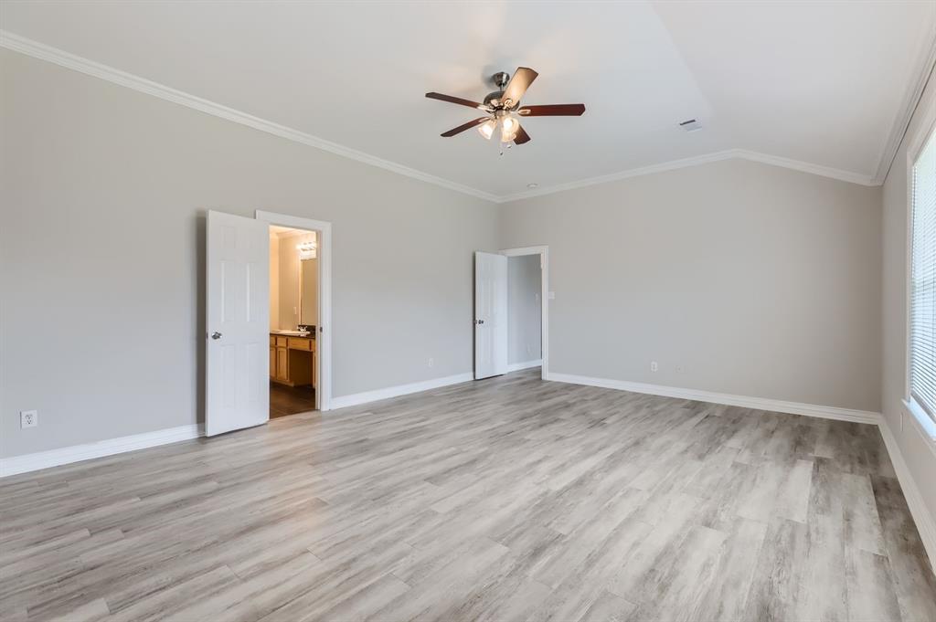 1406 Buckingham Drive Forney, TX 75126 - Photo 21 of 30 a view of empty room with wooden floor