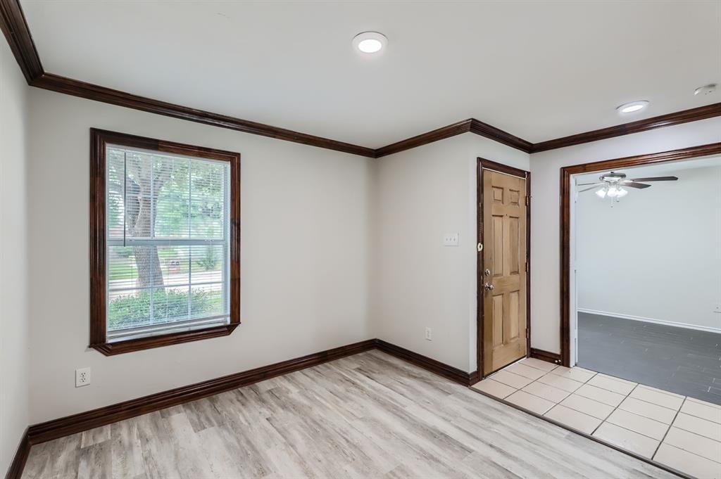 1406 Buckingham Drive Forney, TX 75126 - Photo 5 of 30 a view of an empty room with window and closet area