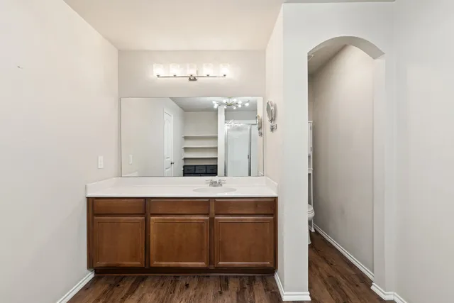 a view of cabinets with wooden floor