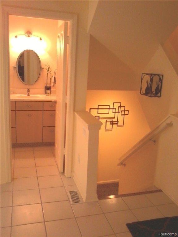 23075 Farmington Road, Unit 15 Farmington, MI 48336 - Photo 4 of 24 Guest Lav-Lower Level.jpg