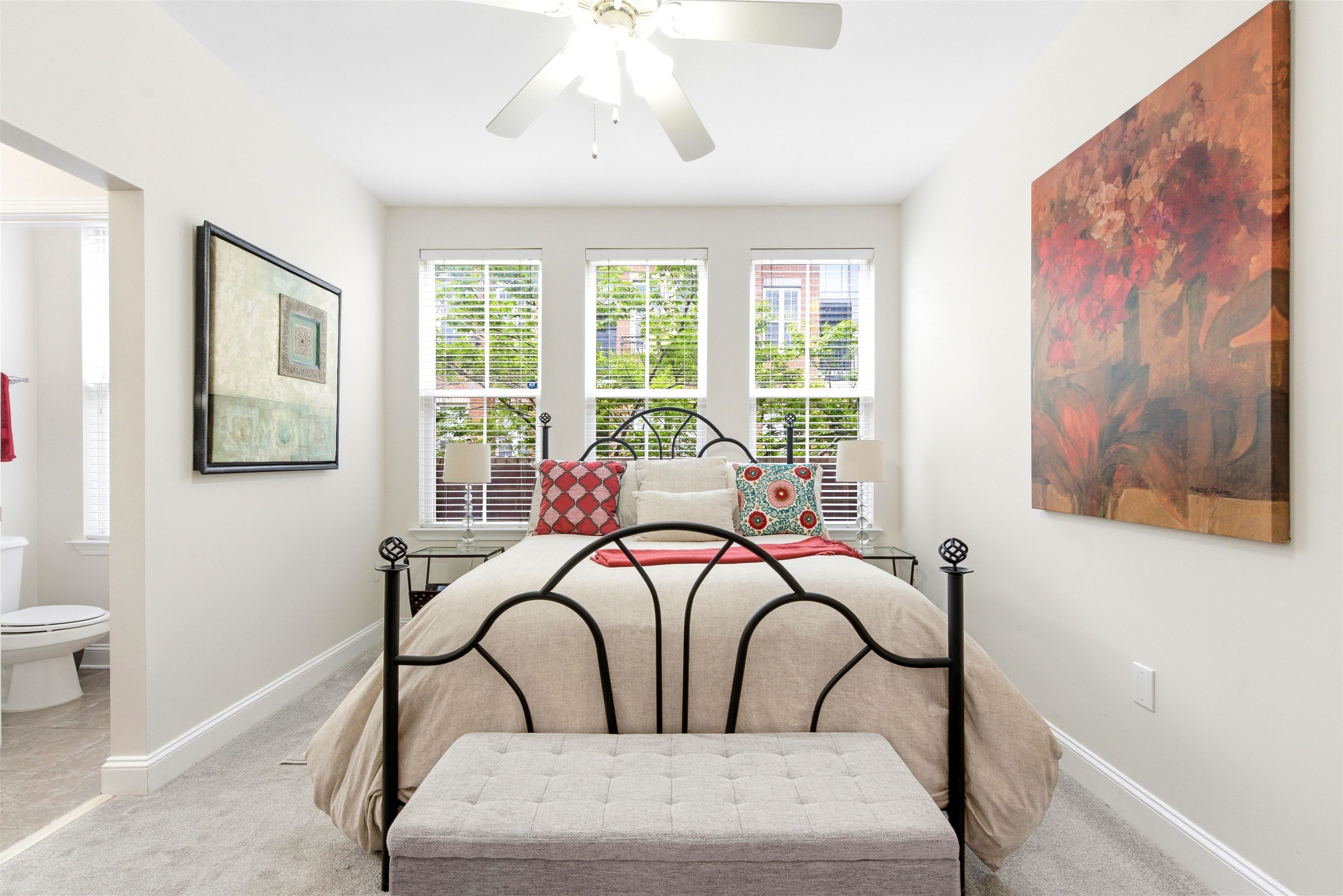 75 Shoemaker Court, Unit 105 Memphis, TN 38103 - Photo 17 of 36 a bedroom with a bed and a table