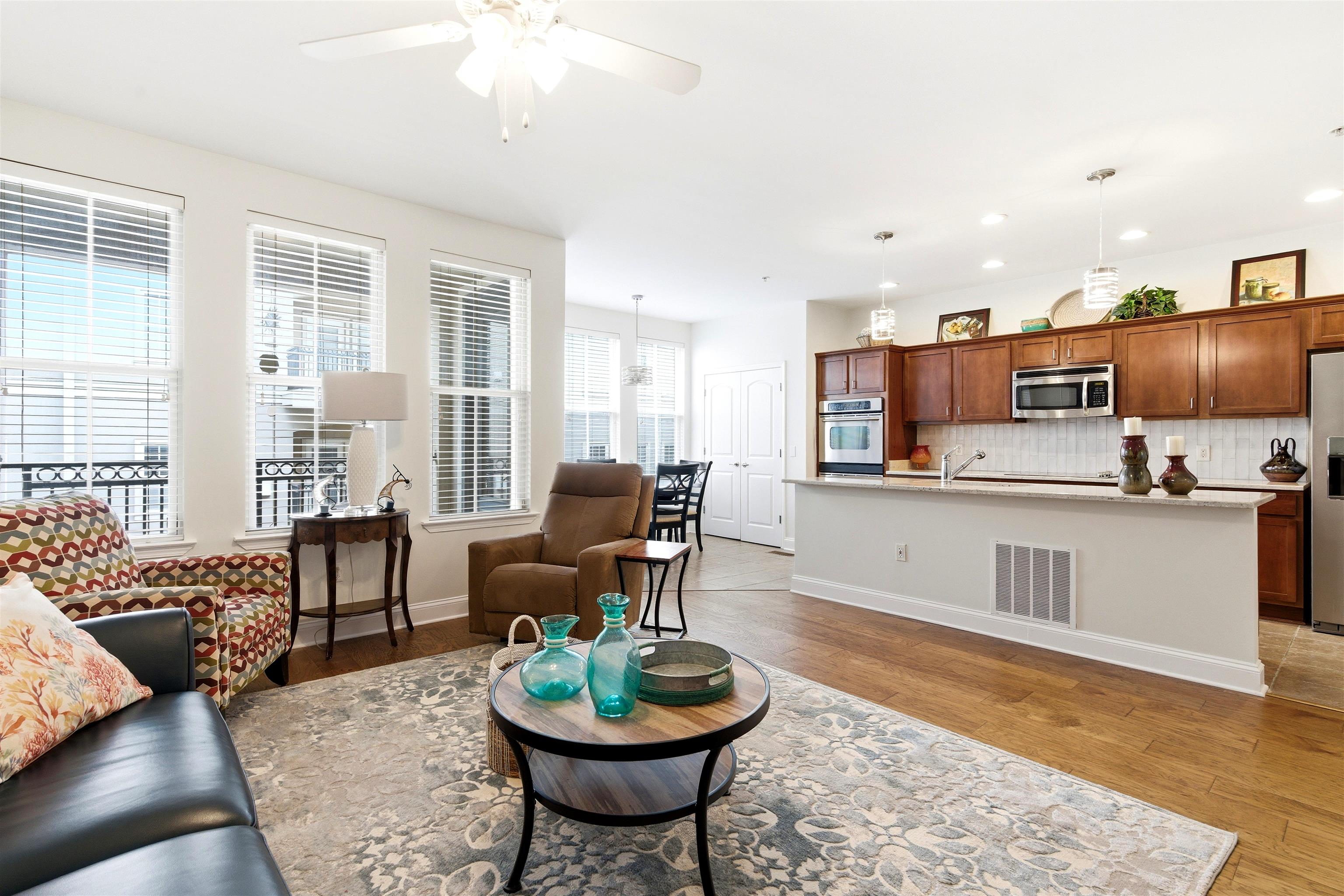 75 Shoemaker Court, Unit 105 Memphis, TN 38103 - Photo 26 of 36 a open kitchen with sink and breakfast area
