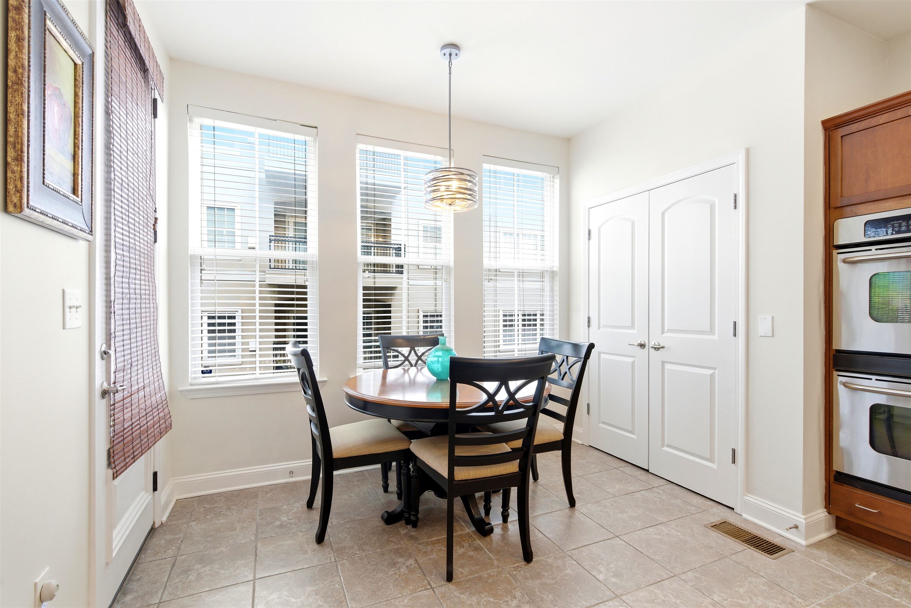 75 Shoemaker Court, Unit 105 Memphis, TN 38103 - Photo 27 of 36 a dining room with furniture and window
