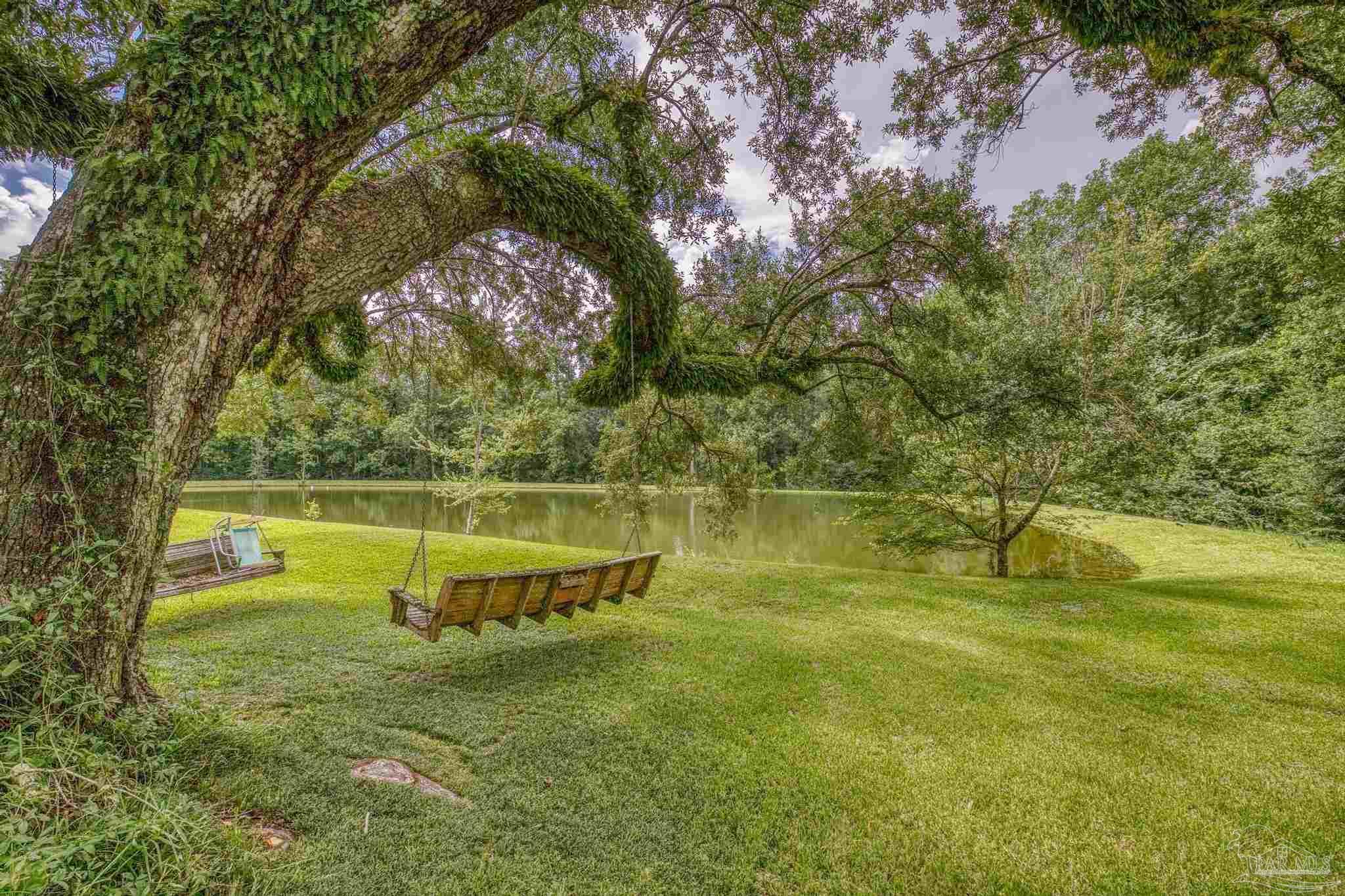 2345 Pompano Street Cantonment, FL 32533 - Photo 1 of 48 a view of a lake view